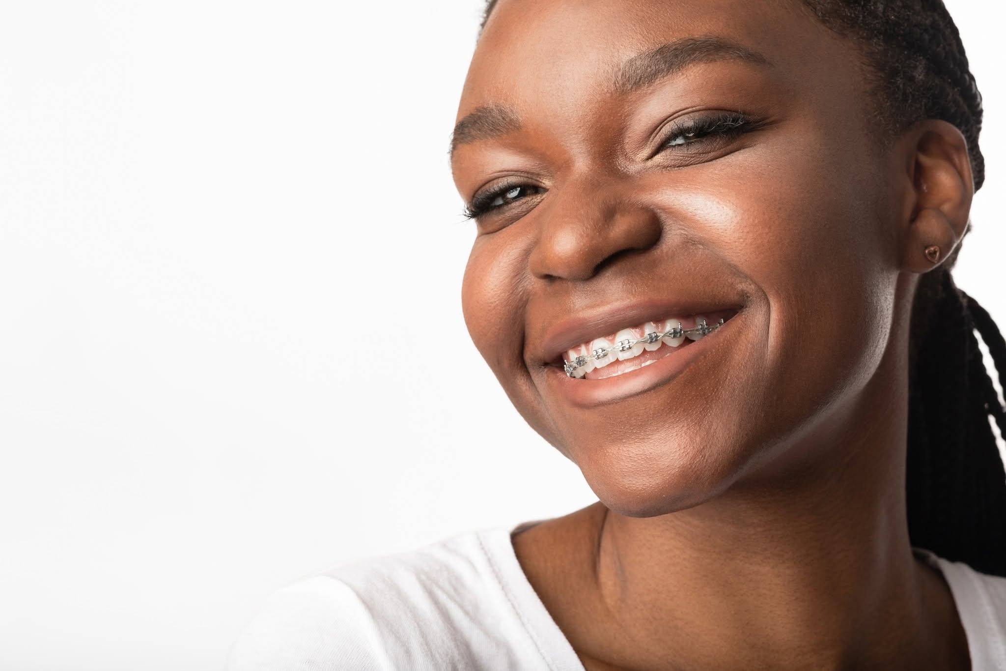 Young patient smiling with braces at Katz Orthodontics